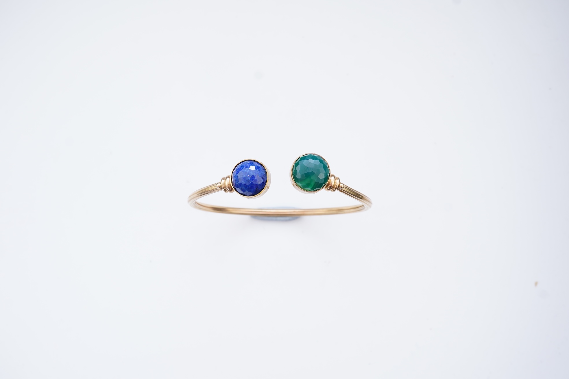 A gold, lapis lazuli and green chalcedony bangle